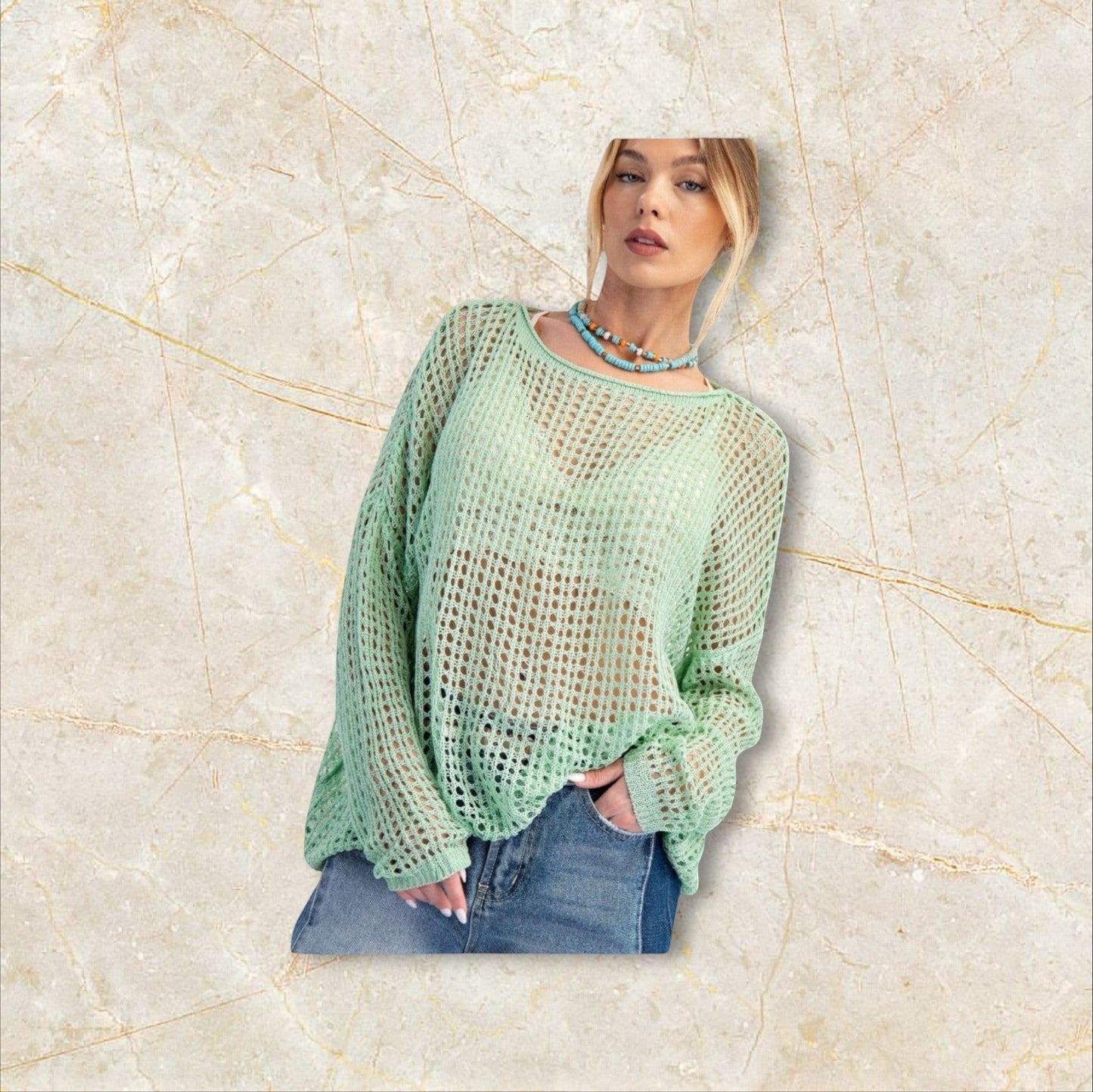 EUKALYPTO sage green open knit sweater with rounded neckline and dropped shoulders. 100% acrylic.