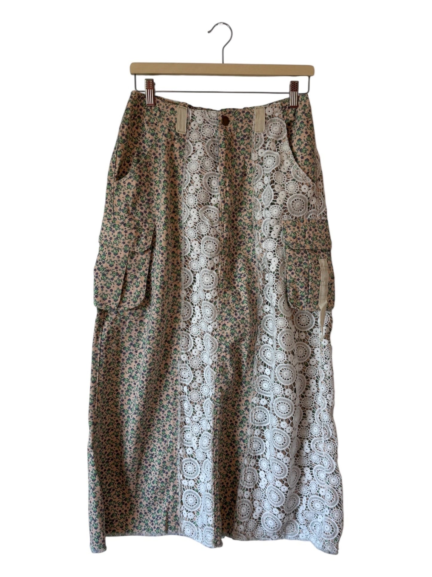 EUKALYPTO boho maxi skirt with patchwork floral print and lace panels, featuring utility pockets.
